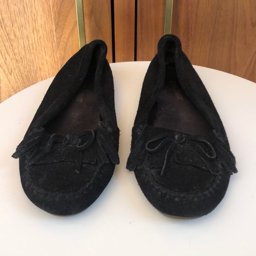 Womens black suede Minnetonka moccasins.